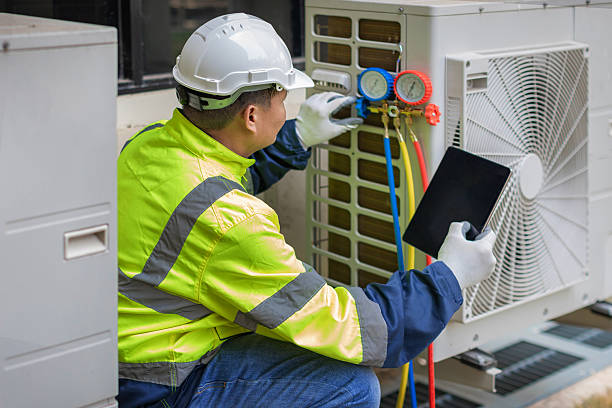 Professional Ac Installation technician working in Montgomery Village, MD
